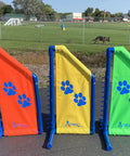 Angled Wing Jump panels for dog agility training. Heavy duty PVC, bright yellow, red, and green. For indoor or outdoor use.
