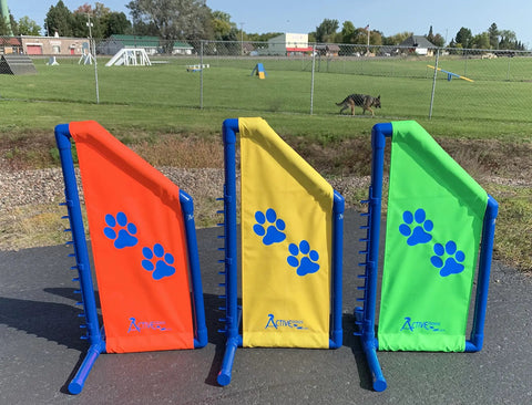 Angled Wing Jump panels for dog agility training. Heavy duty PVC, bright yellow, red, and green. For indoor or outdoor use.
