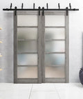 Quadro 4002 Interior Barn Bypass Sliding Doors With Frosted Glass And MDF, 84x96 Inches, Black Modern Style, installed in living room.
