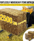 43 Inch Clamp On Pallet Forks For Bucket Attachments Heavy Duty Built Tough For Real World Jobs 2500 Lbs Capacity shown lifting hay bale