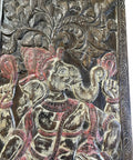 Close-up of the Indian Ganesha motif on a Slick Vintage Carved Wood Barn Door Panel, showcasing intricate craftsmanship and details.