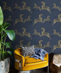Living room with Blue Denim Zebra Safari Peel And Stick Wallpaper, yellow chair, and plant