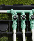 Heavy Duty 3 Valve Preassembled Irrigation Manifold with Swivel Unions installed in garden on artificial grass