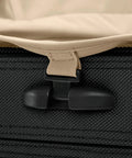 Briggs & Riley Baseline luggage: close-up of black zipper pull with beige strap on softside bag