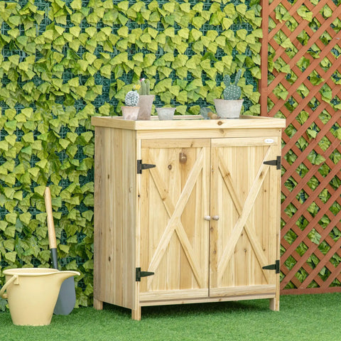Built Tough 32 Inch Workshop Cabinet With Rust Resistant Galvanized Top And Dual Wooden Shelves For Heavy Duty Tool Chest And Real Deal Farmhouse Garage Storage against green wall with potted plants.