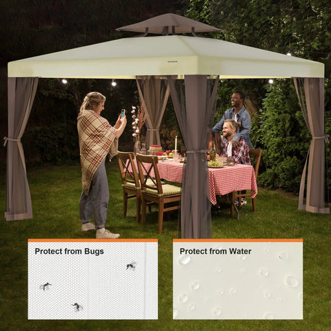Beige 10x10 Patio Gazebo Tent With Removable Netting Outdoor Canopy Shelter For Garden Backyard Deck And Lawn 100 Sq Ft Shade Portable Easy Setup Not A Permanent Structure Great For BBQs And Chill Sessions with people dining underneath.