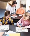 Children in a classroom using the Double Sided Place Value Board 9x12 Inches For Kids, Dry Erase Math Manipulative To Teach Place Values From Billions To Decimal Numbers, A Kid Friendly Lapboard For Home School And Classroom.