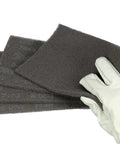 Ultra Fine Grade Hand Pad For Surface Prep And Finishing, Nonwoven Silicon Carbide Scrub Pad, 6 X 9 Inches, Gray, Case Of 60, held by glove