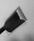 Close-up of Japanese Wood Chisel 1.65 Inch Wide Blade For Woodworking Pro Grade Carbon Steel White Oak Handle Made In Japan Ideal For Furniture Cabinets Architecture And DIY Projects Sharp And Durable showing sharp blade angle