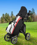 Heavy Duty Aluminum Golf Push Cart With No Fuss Quick Release Fold Build And Low Drag Eva Wheels For Easy Rolling Down The Fairway Dark Gray Edition on the golf course.
