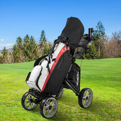 Heavy Duty Aluminum Golf Push Cart With No Fuss Quick Release Fold Build And Low Drag Eva Wheels For Easy Rolling Down The Fairway Dark Gray Edition on the golf course.