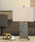 Stone And Metal Table Lamp 26 Inch, Natural Stone And Antique Brass Finish With Designer Oatmeal Shade, in living room setting