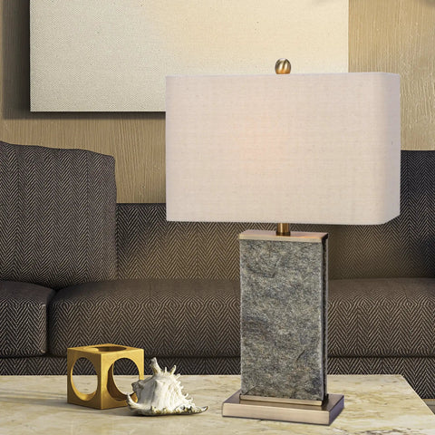 Stone And Metal Table Lamp 26 Inch, Natural Stone And Antique Brass Finish With Designer Oatmeal Shade, in living room setting