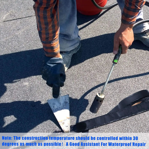 Person applying Two Rolls Asphalt Crack Filler Tape, 3.15 Inch Wide, 50 Feet Each on tarmac surface using a heat tool