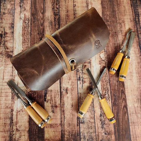 Heavy Duty Tool Roll Up Pouch With 12 Slots Portable Leather Tool Carry Bag on wooden surface with chisels displayed