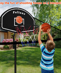 Child playing with Trampoline Basketball Hoop With Net, Easy Install Backyard Hoop For 25mm Straight Or Curved Poles, Includes Mini Ball And Pump