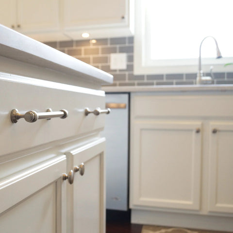 Milano Door And Drawer Pull 8 Inch Center-To-Center In Oil Rubbed Bronze on kitchen cabinets, showing easy install and modern design.
