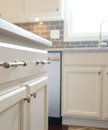 Milano 10 Pack Matte Black Door And Drawer Pulls, 6 Inch Center To Center Cabinet Hardware For Kitchens And Bathrooms installed on cabinets.