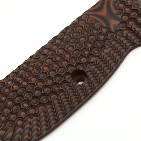 Close-up of Palm Swell Grips For CZ 75 Full Size Orange Black G10 With Palm Texture Free Screws Mag Release Includes O Rings Thin