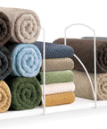 Heavy Duty White Shelf Dividers For Closet Organization And Linen Storage displaying rolled towels on wood shelf.