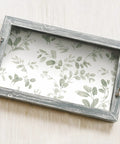 Wooden tray with Dancing Leaves Peel And Stick Wallpaper Green And White For A Quick Easy Wall Makeover No Glue Needed Removable.