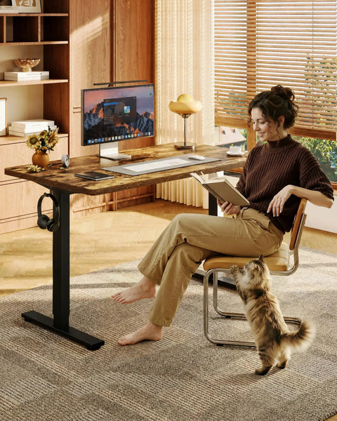 Rock Solid Sit Stand Desk 48 By 24 Inch One Piece Rustic Top Black Frame with woman reading in casual home office.