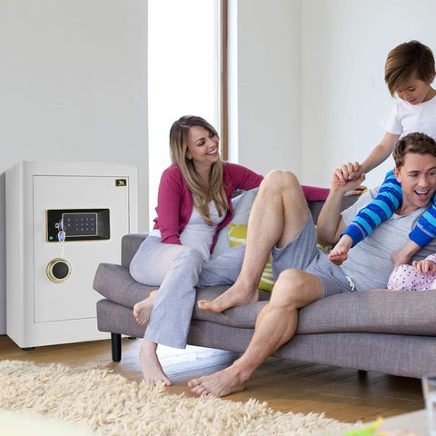 Family relaxing in living room with Built Like A Tank Heavy Duty Home Safe With Digital Touchscreen Lock in white finish, 2.05 cu ft.