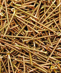 Two Thousand Phillips Bugle Head Screws Number Eight By Two Point Five Inch Coarse Thread Yellow Zinc Plated Steel Drywall And Wood Fasteners in a large pile.