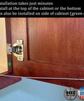 American Made Stainless Steel Cabinet Door Restraint Kit With Flexible Braided Cable installed on a wooden cabinet