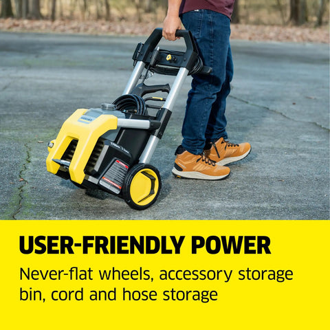 Person pulling Heavy Duty 1700 PSI Pressure Washer With 1.2 GPM, 3 Nozzles, Detergent Tank on never-flat wheels