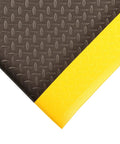Corner view of Diamond Sof-Tred Anti Fatigue Mat With Dyna-Shield Beveled Edges For Home Or Business 2 Ft By 6 Ft Black Yellow One Half Inch Thick
