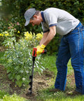 Man using Heavy Duty Garden Auger Drill Bit Shredding Rocky Clay Dirt Like Hot Butter to plant bulbs in garden herbs.