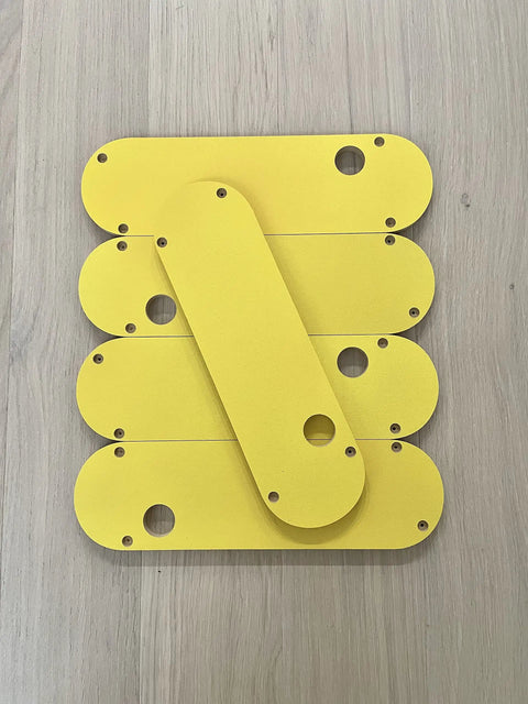 Zero Clearance Inserts Set Five Pack For DWE7485 Table Saw, Pro Grade Fit, yellow MDF plates stacked flat on wood surface