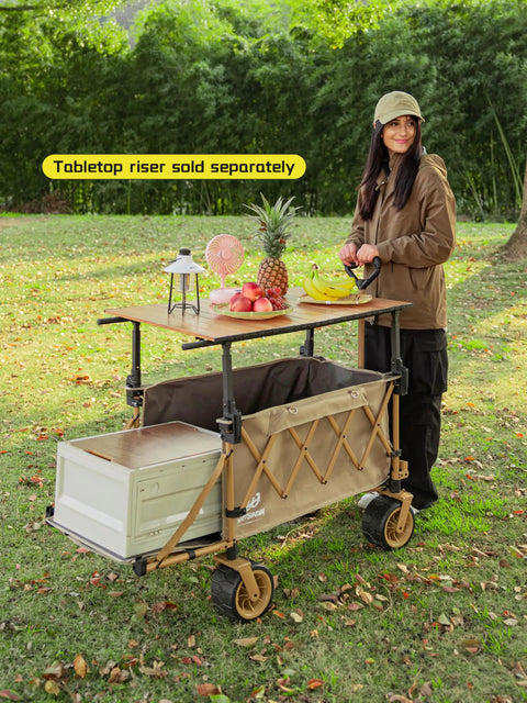 Heavy Duty Collapsible Folding Wagon With Integrated Aluminum Table All Terrain Beach Cart With Open Tailgate in use outdoors