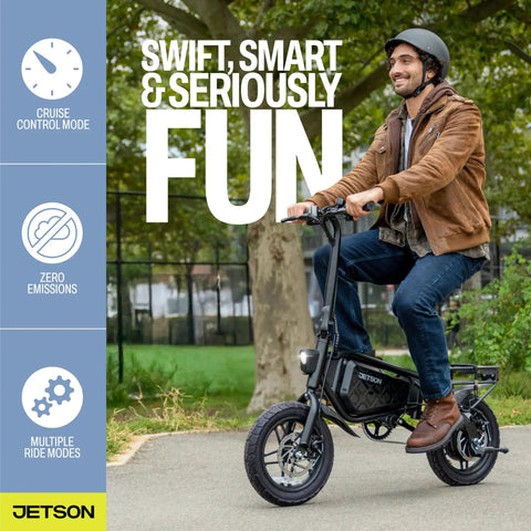Man riding a foldable electric bike with carry handles portable 350W pedal assist twist throttle up to 15.5 MPH 14 inch tires