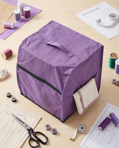 Purple serger dust cover for overlock machine 31x28x31cm universal fit Oxford cloth with handle and pockets on sewing table.