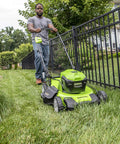 40V Cordless 21-Inch Brushless Push Mower With Dual 4.0Ah And 2.0Ah USB Batteries, Charger Included, Automatic Battery Switch-Over For Longer Run Time, Easy One-Lever 7-Position Height Adjustment in use on lawn