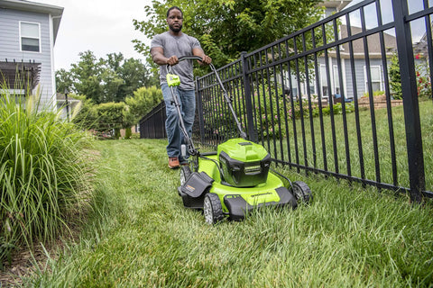 40V Cordless 21-Inch Brushless Push Mower With Dual 4.0Ah And 2.0Ah USB Batteries, Charger Included, Automatic Battery Switch-Over For Longer Run Time, Easy One-Lever 7-Position Height Adjustment in use on lawn