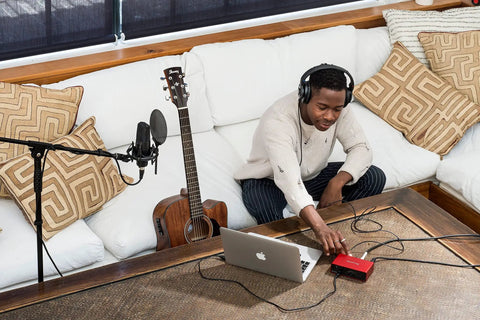 Scarlett Solo 3rd Gen USB Audio Interface Bundle With LyxPro Cardioid Condenser Mic, Shock Mount, and Studio Headphones in use