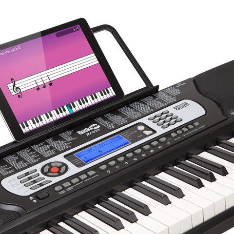 54 Key Keyboard Piano Kit With Power Supply, Sheet Music Stand, Note Stickers And Lessons For Beginners shown with tablet app