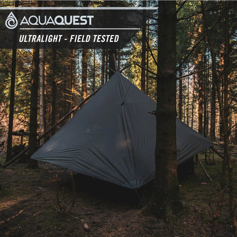 Ultralight Waterproof Tarp For Backpacking And Thru-Hiking, Seam-Taped 5,000 Mm Rain Fly, 40D Ripstop Nylon pitched in forest