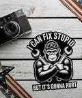 I Can Fix Stupid But It's Gonna Hurt Mechanic Gorilla Wrench Sticker Set displayed on a wooden surface with camera