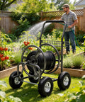 Garden Hose Reel Cart With 250 Ft Capacity, 10 Inch Pneumatic Tires, beside a man watering a garden.