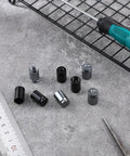 Bullet Style Valve Stem Caps Aluminum Alloy Built Tough Dustproof Waterproof, Black and Titanium, 8 Pack on metal grid