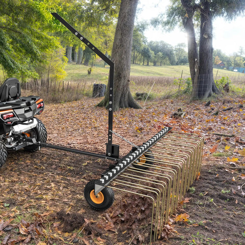 60 Inch Tow Behind Dethatcher for Lawn and ATV, Heavy Duty Lawn Rake with 24 Spring Steel Tines in use