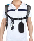 Heavy Duty Backpack Chest Strap With Quick Release Buckle worn by person, showing adjustable fit and D ring attachments, black.