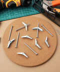 20 Piece Wing Nut And Bolt Kit With Toggle Bolts For Drywall And Heavy Duty Fastening arranged on cork board with tools