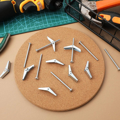 20 Piece Wing Nut And Bolt Kit With Toggle Bolts For Drywall And Heavy Duty Fastening arranged on cork board with tools