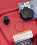 Close-up of EPA Certified Six Gallon Portable Fuel Tank for Boats, red with built-in vacuum vent valve, cap visible.