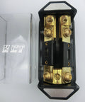 Two Way ANL Fuse Holder For Car Audio One Zero Gauge In Two Four Gauge Out Gold Plated Terminals Includes Two 100 Amp Fuses Up To 300 Amp Power Distribution Block, top view showing gold terminals and transparent cover